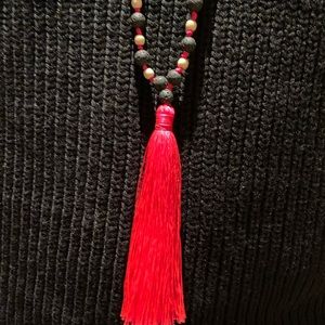 Beaded necklace with tassle